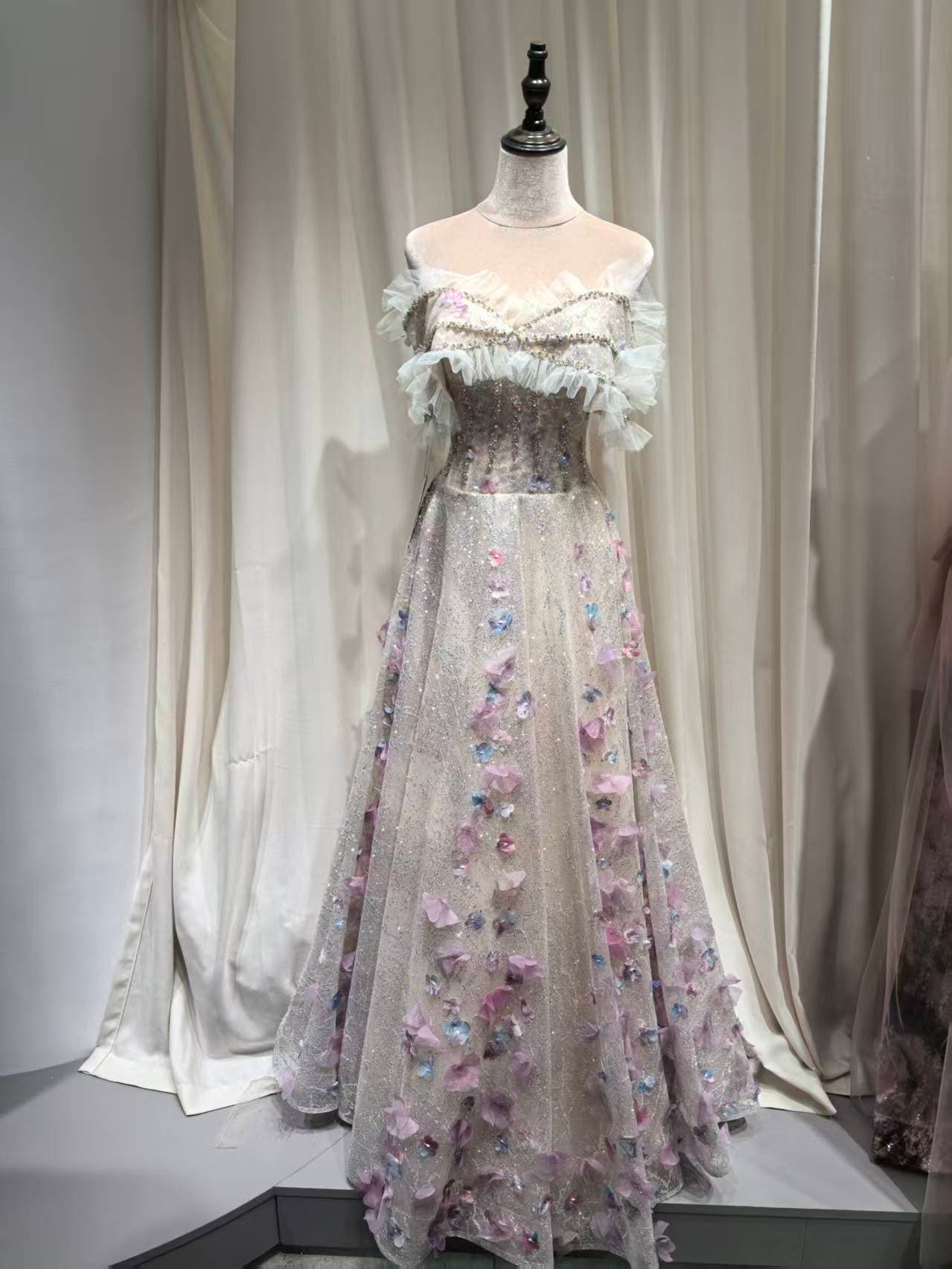 Women’s Distinction Ivory Gown with 3D Floral Embellishments.
